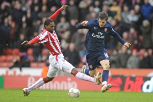 Aaron Ramsey (Arsenal) Salif Diao (Stoke). Stoke City 3:1 Arsenal, FA Cup 4th round Aaron Ramsey (Arsenal) Salif Diao (Stoke). Stoke City 3:1 Arsenal, FA Cup 4th round