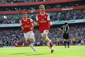 Images Dated 1st May 2011: Aaron Ramsey celebrates scoring Arsenals goal with Robin van Persie