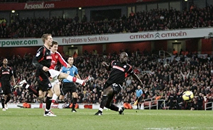 Aaron Ramsey scores Arsenal's 2nd goal under pressure from Abdoulaye Faye Aaron Ramsey scores Arsenal's 2nd goal under pressure from Abdoulaye Faye