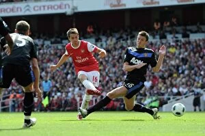 Images Dated 1st May 2011: Aaron Ramsey scores Arsenals goal past Michael Carrick (Man Utd). Arsenal 1
