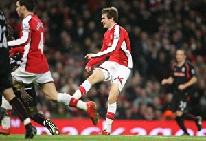 Aaron Ramsey shoots past Stoke goalkeeper Thomas Sorensen to score the 2nd Arsenal goal Aaron Ramsey shoots past Stoke goalkeeper Thomas Sorensen to score the 2nd Arsenal goal