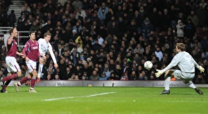 Aaron Ramsey shoots past West Ham goalkeeper Rob Green to score the 1st Arsenal goal Aaron Ramsey shoots past West Ham goalkeeper Rob Green to score the 1st Arsenal goal