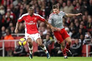 Images Dated 21st December 2008: Abou Diaby (Arsenal) Steven Gerrard (Liverpool)