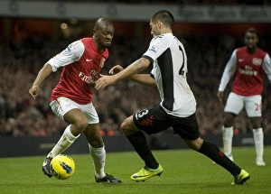 Abou Diaby of Arsenal takes on Clint Dempsey of Fulham during the Barclays Premier League Abou Diaby of Arsenal takes on Clint Dempsey of Fulham during the Barclays Premier League
