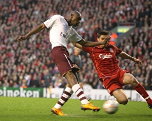 Abou Diaby scores Arsenals 1st goal under pressure from Xabi Alonso (Liverpool) Abou Diaby scores Arsenals 1st goal under pressure from Xabi Alonso (Liverpool)