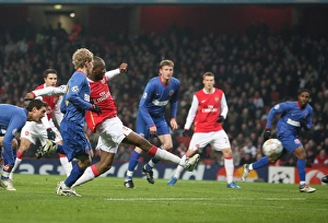 Abu Diaby shoots past Bucuresti keeper Robinson Zapata to score the 1st Arsenal goal Abu Diaby shoots past Bucuresti keeper Robinson Zapata to score the 1st Arsenal goal
