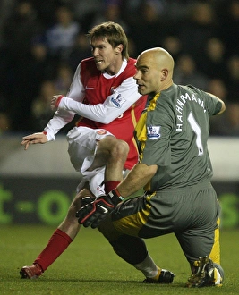 Alex Hleb shoots past Reading goalkeeper Marcus Hahnemann to score the 3rd Arsenal goal Alex Hleb shoots past Reading goalkeeper Marcus Hahnemann to score the 3rd Arsenal goal
