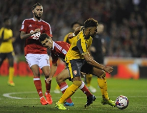 Alex Oxlade-Chamberlain (Arsenal) Eric Lichaj (Forest). Nottingham Forest 0:4 Arsenal Alex Oxlade-Chamberlain (Arsenal) Eric Lichaj (Forest). Nottingham Forest 0:4 Arsenal