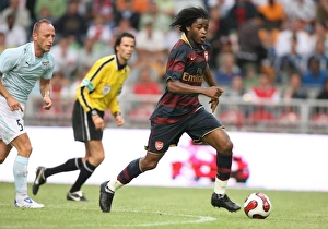 Alex Song (Arsenal) Massimo Mutarelli (Lazio) Alex Song (Arsenal) Massimo Mutarelli (Lazio)
