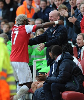 Alex Song celebrates scoring the Arsenal goal with masseur John Kelly. Arsenal 1 Alex Song celebrates scoring the Arsenal goal with masseur John Kelly. Arsenal 1