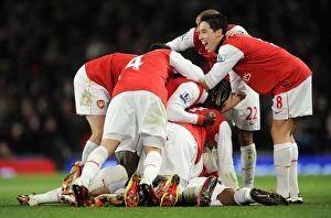 Images Dated 27th December 2010: Alex Song celebrates scoring Arsenals 1st goal with his team mates including Samir Nasri