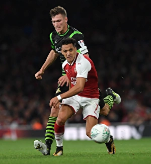 Alexis Sanchez (Arsenal) Joe Wright (Doncaster). Arsenal 1:0 Doncaster. The Carabao Cup Alexis Sanchez (Arsenal) Joe Wright (Doncaster). Arsenal 1:0 Doncaster. The Carabao Cup