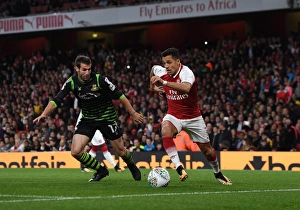 Alexis Sanchez (Arsenal) Matty Blair (Doncaster). Arsenal 1:0 Doncaster. The Carabao Cup Alexis Sanchez (Arsenal) Matty Blair (Doncaster). Arsenal 1:0 Doncaster. The Carabao Cup