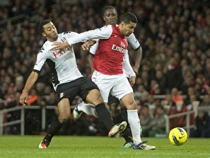 Andre Santos of Arsenal takes on Mousa Dembele of Fulham during the Barclays Premier Andre Santos of Arsenal takes on Mousa Dembele of Fulham during the Barclays Premier