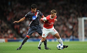 Andrey Arshavin (Arsenal) Luis Aguiar (Braga). Arsenal 6:0 SC Braga, UEFA Champions League Andrey Arshavin (Arsenal) Luis Aguiar (Braga). Arsenal 6:0 SC Braga, UEFA Champions League