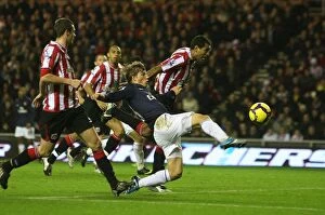 Images Dated 21st November 2009: Andrey Arshavin (Arsenal) Paulo Da Silva (Sunderland). Sunderland 1: 0 Arsenal