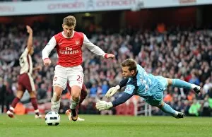 Images Dated 5th March 2011: Andrey Arshavin (Arsenal) rounds Simon Migonlet (Sunderland) to score a goal that is ruled out for