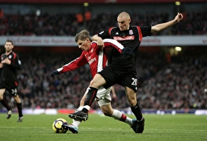 Andrey Arshavin holds off Andy Wilkinson (Stoke) on his way to scoring Arsenal' Andrey Arshavin holds off Andy Wilkinson (Stoke) on his way to scoring Arsenal'