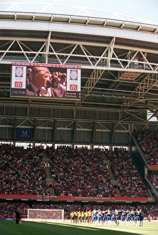 The Arsenal and Chelsea players observe a minute silence for the people that lost their The Arsenal and Chelsea players observe a minute silence for the people that lost their