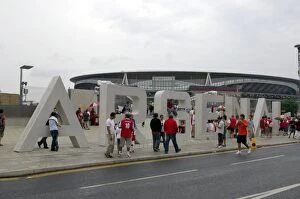 Fans Collection: Arsenal fans gather outside the Emirates Stadium on thegiant letters near the south bridge