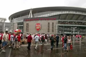Images Dated 25th July 2006: Arsenal fans gather outside the Emirates Stadium