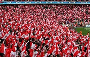 Images Dated 6th May 2009: Arsenal fans wave their flags before the match