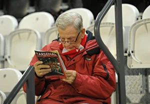 Arsenal Ladies fan readng the programme. Arsenal Ladies 3:1 Reading FC Women. WSL Arsenal Ladies fan readng the programme. Arsenal Ladies 3:1 Reading FC Women. WSL