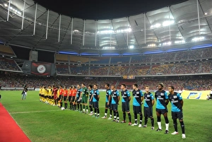 The Arsenal and Malaysia team line up before the match. Malaysia XI 0:4 Arsenal The Arsenal and Malaysia team line up before the match. Malaysia XI 0:4 Arsenal