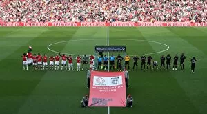 Images Dated 24th April 2010: The Arsenal and Man City teams line up behiind Back the bid banner. Arsenal 0