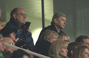 Arsenal manager Arsene Wenger and 1st team Coach watch the match from the Directors box Arsenal manager Arsene Wenger and 1st team Coach watch the match from the Directors box