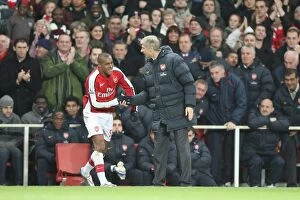 Images Dated 11th November 2008: Arsenal manager Arsene Wenger congratulates Jay Simpson