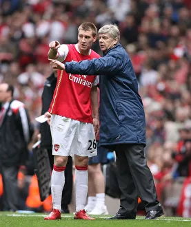 Arsenal manager Arsene Wenger with Nicklas Bendtner during the match Arsenal manager Arsene Wenger with Nicklas Bendtner during the match