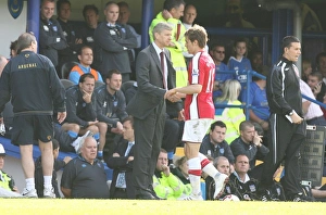 Arsenal manager Arsene Wenger shakes hands with Aaron Arsenal manager Arsene Wenger shakes hands with Aaron