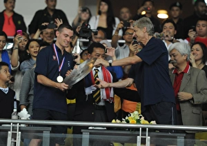 Arsenal manager Arsene Wenger and Thomas Vermaelen with the Malaysian Prime Minister Arsenal manager Arsene Wenger and Thomas Vermaelen with the Malaysian Prime Minister