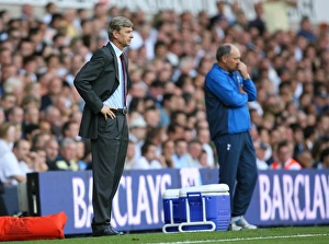 Arsenal manager Arsene Wenger and Tottenham manager Martin Jol during the match Arsenal manager Arsene Wenger and Tottenham manager Martin Jol during the match