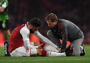 Arsenal physio Colin Lewin treats Olivier Giroud (Arsenal). Arsenal 1:0 Doncaster Arsenal physio Colin Lewin treats Olivier Giroud (Arsenal). Arsenal 1:0 Doncaster