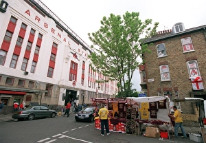 Arsenal Stadium with a house on Conewood Street with Arsenal posters in the windows Arsenal Stadium with a house on Conewood Street with Arsenal posters in the windows