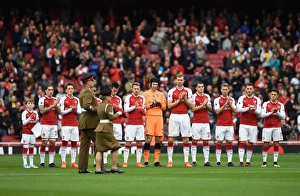 The Arsenal team clap the soldiers with the rememberance reef before the match. Arsenal 2 The Arsenal team clap the soldiers with the rememberance reef before the match. Arsenal 2