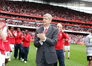 Arsene Wenger the Arsenal Manager claps the fans during the lap of the pitch to thank the Arsene Wenger the Arsenal Manager claps the fans during the lap of the pitch to thank the