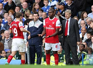Arsene Wenger the Arsenal Manager with Jay Emmanuel Thomas who is coming on for Jack Arsene Wenger the Arsenal Manager with Jay Emmanuel Thomas who is coming on for Jack