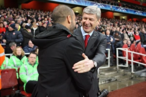 Arsene Wenger the Arsenal Manager shakes hands with Josep Guardiola the Barcelona Manager Arsene Wenger the Arsenal Manager shakes hands with Josep Guardiola the Barcelona Manager