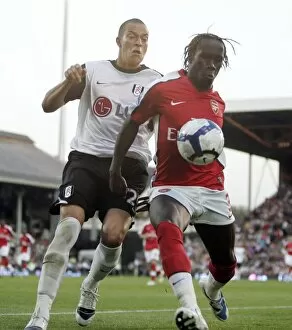 Images Dated 26th September 2009: Bacary Sagna (Arsenal) Bobby Zamora (Fulham)