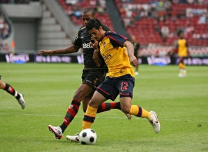 Carlos Vela beats Seville defender Abdoulay Konko to Carlos Vela beats Seville defender Abdoulay Konko to