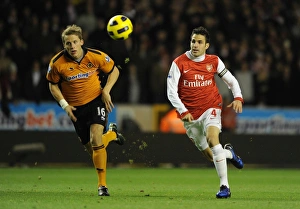 Cesc Fabregas (Arsenal) Christophe Berra (Wolves). Wolverhampton Wanderers 0:2 Arsenal Cesc Fabregas (Arsenal) Christophe Berra (Wolves). Wolverhampton Wanderers 0:2 Arsenal