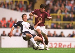 Cesc Fabregas (Arsenal) Lee Young-Pyo (Tottenham) Cesc Fabregas (Arsenal) Lee Young-Pyo (Tottenham)