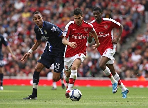 Cesc Fabregas (Arsenal) Steven Nzonzi (Blackburn) Cesc Fabregas (Arsenal) Steven Nzonzi (Blackburn)