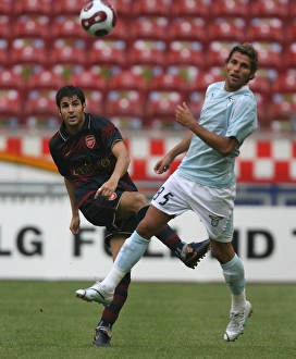 Cesc Fabregas (Arsenal) Valon Behrami (Lazio) Cesc Fabregas (Arsenal) Valon Behrami (Lazio)