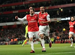 Images Dated 27th December 2010: Cesc Fabregas celebrates scoring Arsenals 2nd goal with Theo Walcott