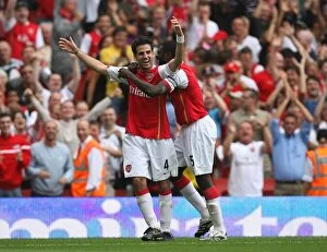 Images Dated 22nd September 2007: Cesc Fabregas celebrates scoring Arsenals 4th goal with Kolo Toure