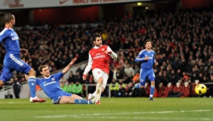 Cesc Fabregas scores Arsenal's 2nd goal under pressure from Branislav Invanovic Cesc Fabregas scores Arsenal's 2nd goal under pressure from Branislav Invanovic
